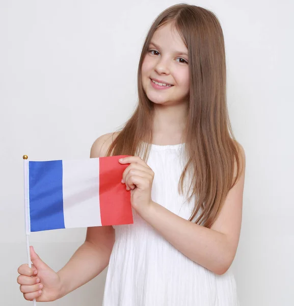 Preciosa Niña Europea Sosteniendo Bandera Francesa —  Fotos de Stock