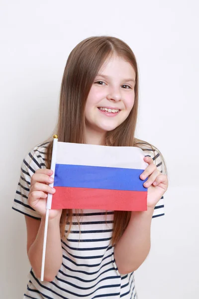 可爱的小女孩和俄罗斯国旗 — 图库照片