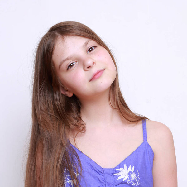 Studio portrait of emotional little girl