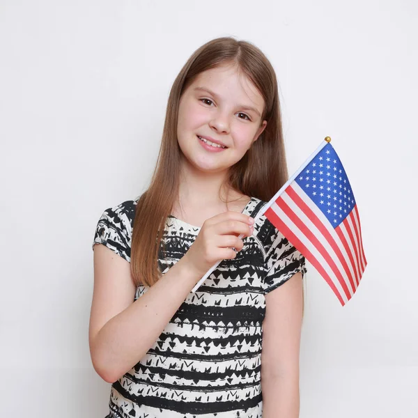 Menina bonito e bandeira — Fotografia de Stock