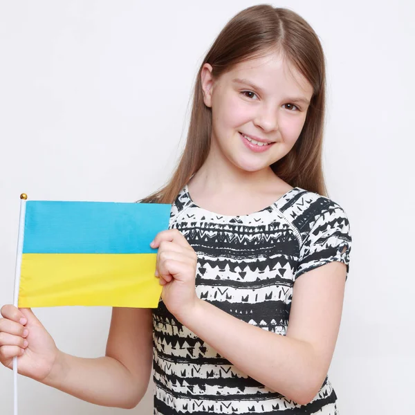 Teen girl and flag — Stock Photo, Image