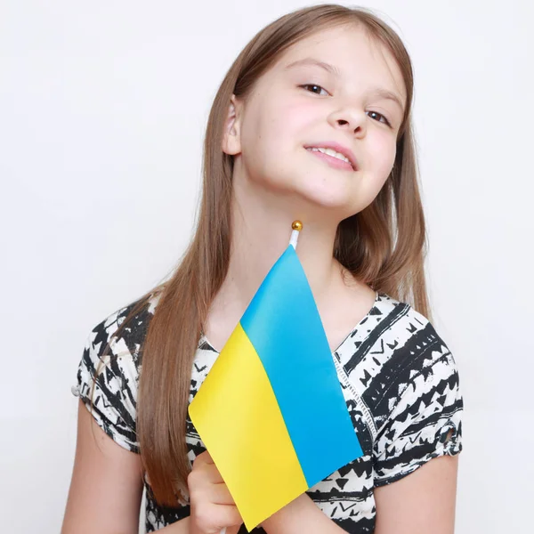 Юная девушка и флаг — стоковое фото