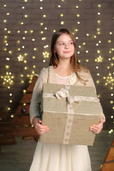 Little Girl Holding Christmas Present — Stock Photo, Image