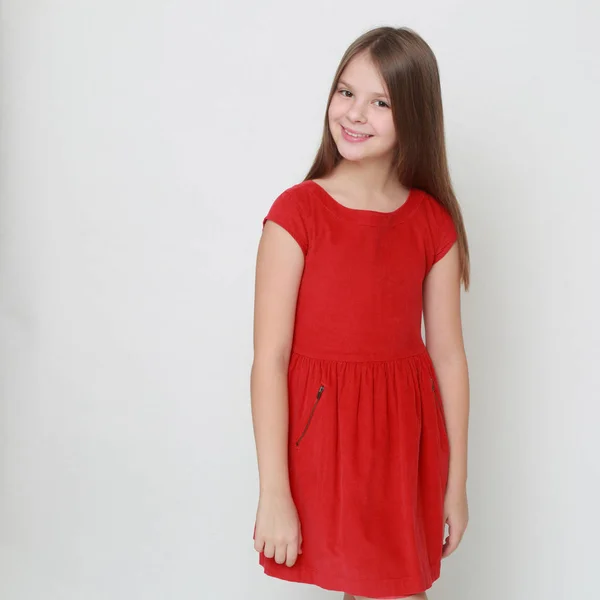 Emocional Niña Usando Vestido Rojo —  Fotos de Stock