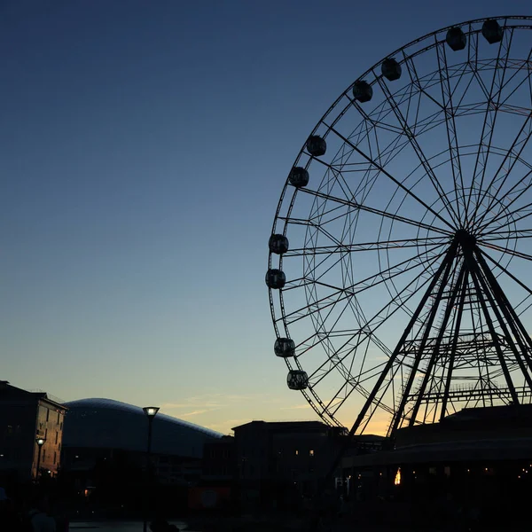 Attraction wheel review over Sochi park at summer evening time, Sochi, Russian Federation. Selected Focus.