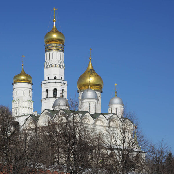 Outdoor view on Kremlin in details from the background of Kremlevskaya embankment at sunny day in early spring.