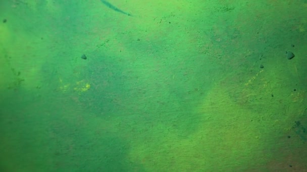 ワークスペースのテクスチャの背景 緑の柔らかいペーストでアーティストの作品 — ストック動画