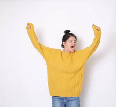 Funny emotional caucasian woman studio portrait/Joyful woman posing on camera