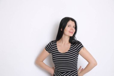 Funny emotional caucasian woman studio portrait/Joyful woman posing on camera