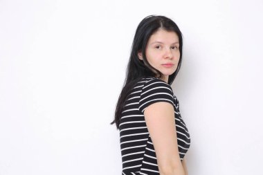 Funny emotional caucasian woman studio portrait/Joyful woman posing on camera