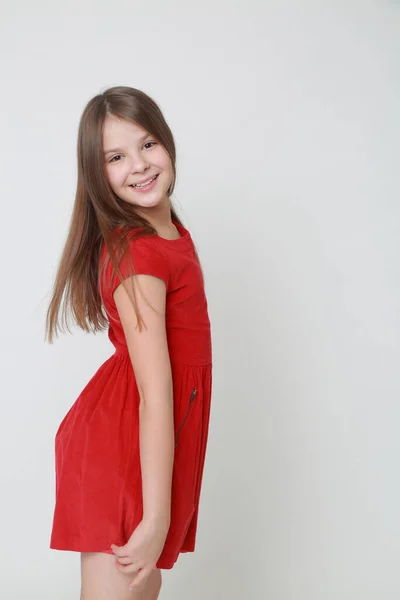 Emotional Little Girl Wearing Red Dress — Stock Photo, Image