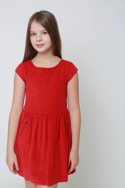 Emotional Little Girl Wearing Red Dress — Stock Photo, Image