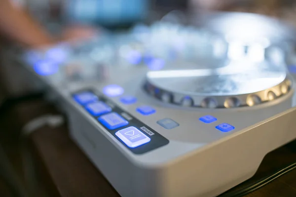 DJ CD player and mixer at wedding