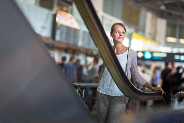 Young female passenger at the airport — Stock Photo, Image