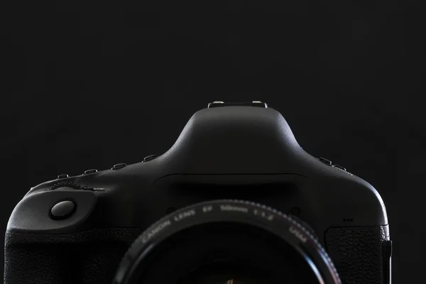 Professional modern DSLR camera low key stock photo/image — Stock Photo, Image