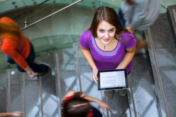 At the university / college - Students rushing up and down a busy — стоковое фото