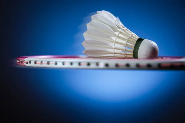 Badminton racket and shuttlecock  in motion closeup — Stock Photo, Image