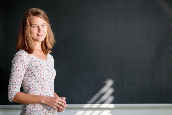 Pretty Young Female Student Young Teacxher Front Blackboard Class — Stock Photo, Image