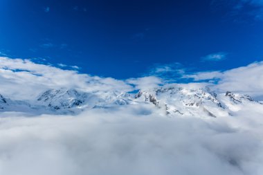 Snow mountains at Zermatt clipart
