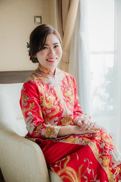 Happy Asian Bride Wedding National Traditional Costume Sitting Armchair Room Royalty Free Stock Images