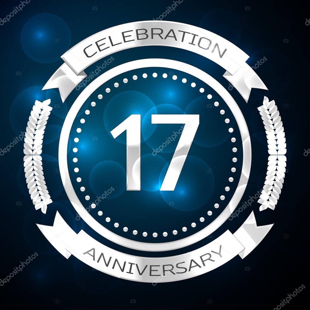 Seventeen years anniversary celebration with silver ring and ribbon on blue background. Vector illustration