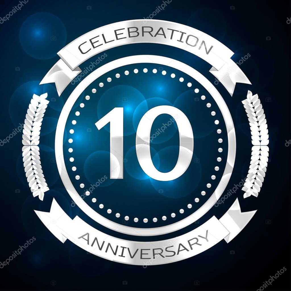 Ten years anniversary celebration with silver ring and ribbon on blue background. Vector illustration