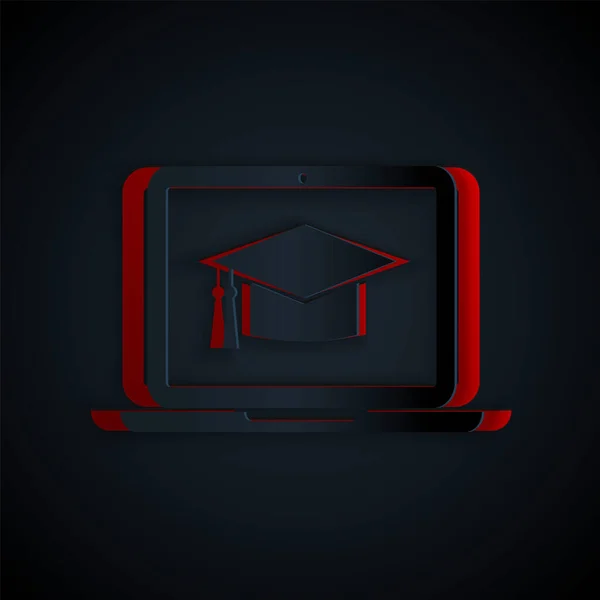 Papperssnitt Graduation cap på skärmen laptop ikon isolerad på svart bakgrund. Nätbaserad inlärning eller e-lärande. Papperskonst. Vektor Illustration — Stock vektor