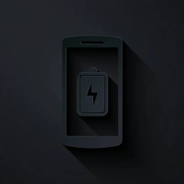 Papier gesneden Smartphone batterij opladen pictogram geïsoleerd op zwarte achtergrond. Telefoon met bijna lege batterij. Papierkunst stijl. Vector Illustratie — Stockvector