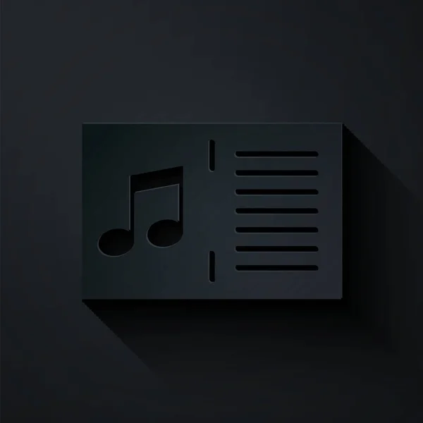 Paper cut Music book with note icon isolated on black background. Music sheet with note stave. Notebook for musical notes. Paper art style. Vector Illustration — ストックベクタ