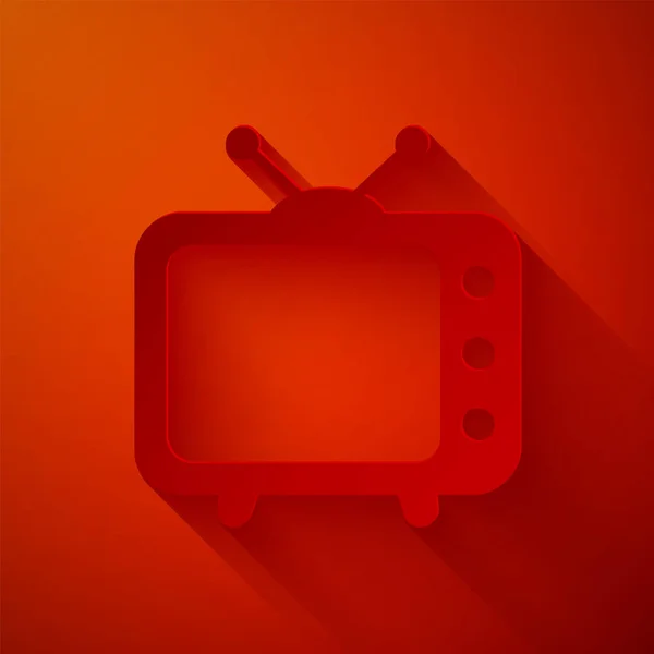 Papier gesneden Tv pictogram geïsoleerd op rode achtergrond. Televisieteken. Papierkunst stijl. Vector Illustratie — Stockvector
