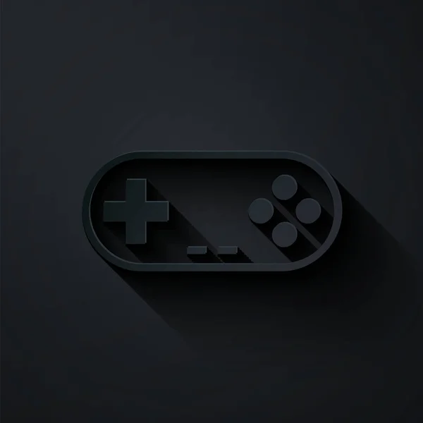Бумага вырезать иконку Gamepad изолированы на черном фоне. Игровой контроллер. Бумажный стиль. Векторная миграция — стоковый вектор