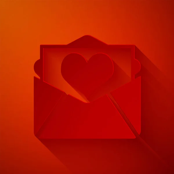 Cięcie papieru Koperta z ikoną Walentynki serca izolowane na czerwonym tle. List o miłości i romansie. Papier w stylu sztuki. Ilustracja wektora — Wektor stockowy