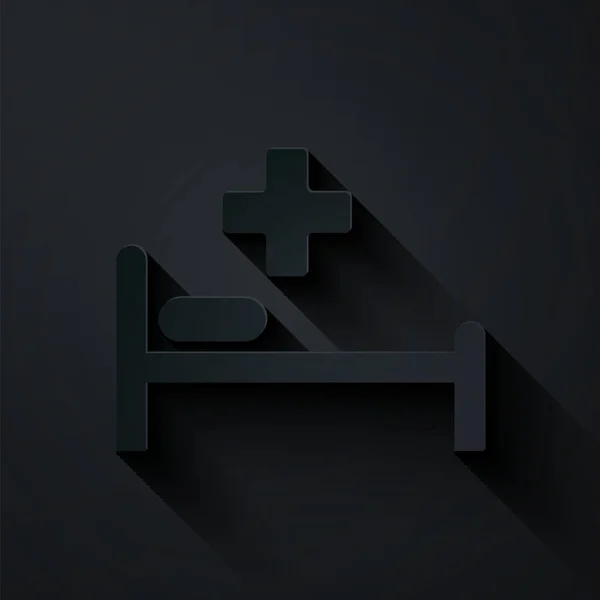 Řez papíru Nemocniční postel s lékařským symbolem pohotovosti - hvězda života ikona izolované na černém pozadí. Papírový styl. Vektorová ilustrace — Stockový vektor