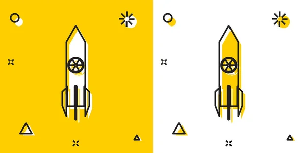 Ícone de foguete nuclear preto isolado em fundo amarelo e branco. Uma bomba voa para baixo. Formas dinâmicas aleatórias. Ilustração vetorial — Vetor de Stock