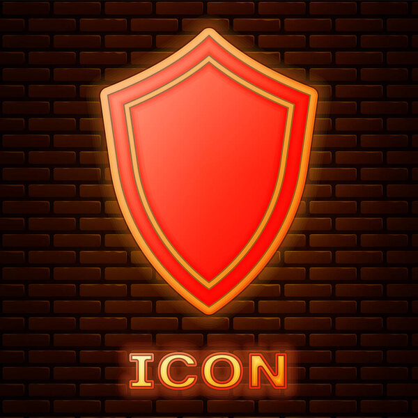 Glowing neon Shield icon isolated on brick wall background. Guard sign. Vector Illustration