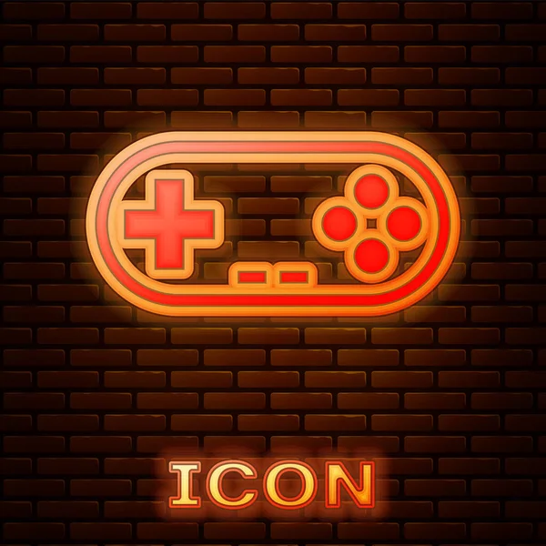 Ícone Gamepad de néon brilhante isolado no fundo da parede de tijolo. Controlador de jogo. Ilustração vetorial — Vetor de Stock