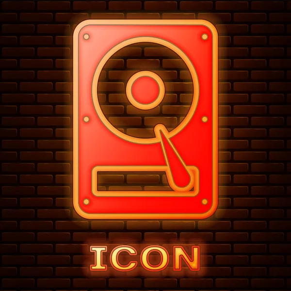 Disco rigido al neon luminoso icona HDD isolato su sfondo muro di mattoni. Illustrazione vettoriale — Vettoriale Stock