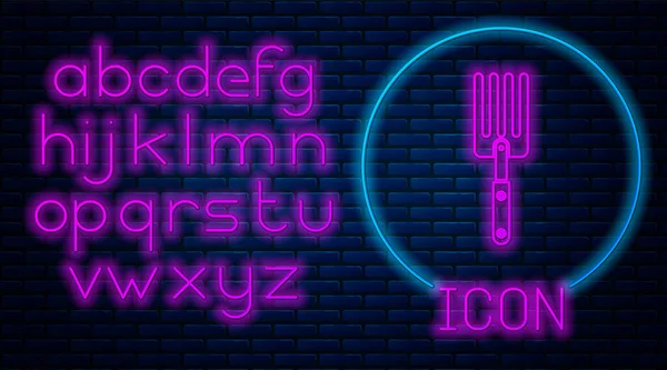 Gloeiende neon Tuin vork pictogram geïsoleerd op baksteen muur achtergrond. Pitchfork icoon. Gereedschap voor tuinbouw, landbouw, landbouw. Neon licht alfabet. Vector Illustratie — Stockvector