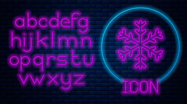 Glowing neon Snowflake icon isolated on brick wall background. Neon light alphabet. Vector Illustration — Stock Vector
