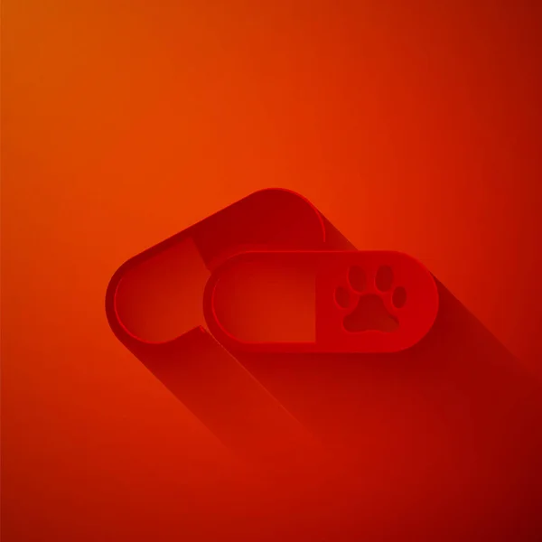 Papiergeschnittener Hund und Pillen-Symbol isoliert auf rotem Hintergrund. Verschreibungspflichtige Medikamente für Tiere. Papierkunst. Vektorillustration — Stockvektor