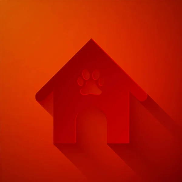 Carta tagliata Casa del cane e zampa icona dell'animale domestico di stampa isolato su sfondo rosso. Canile per cani. Stile cartaceo. Illustrazione vettoriale — Vettoriale Stock