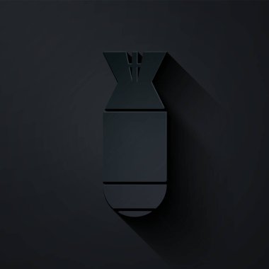 Kağıt kesiği Havacılık bomba ikonu siyah arka planda izole edildi. Roket bombası düşüyor. Kağıt sanatı tarzı. Vektör İllüstrasyonu