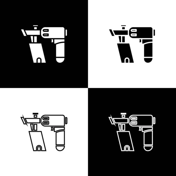 Définir l'icône du pistolet à ongles isolé sur fond noir et blanc. Illustration vectorielle — Image vectorielle