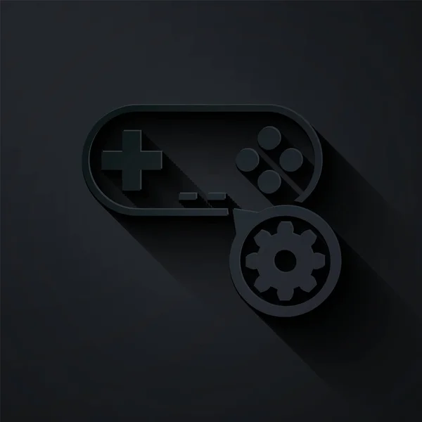 Paper cut Gamepad and gear icon isolated on black background. Adjusting app, service concept, setting options, maintenance, repair, fixing. Paper art style. Vector Illustration — Stock Vector