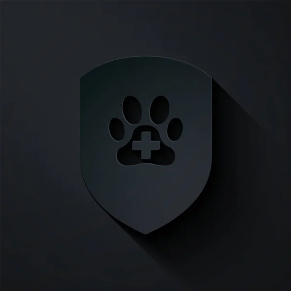 Corte de papel Icono de seguro de salud animal aislado sobre fondo negro. Icono de protección para mascotas. Huella de pata de perro o gato. Estilo de arte de papel. Ilustración vectorial — Vector de stock