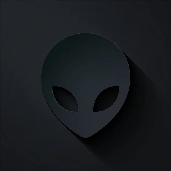 Řez papíru Alien ikona izolované na černém pozadí. Mimozemská mimozemská tvář nebo symbol hlavy. Papírový styl. Vektorová ilustrace — Stockový vektor