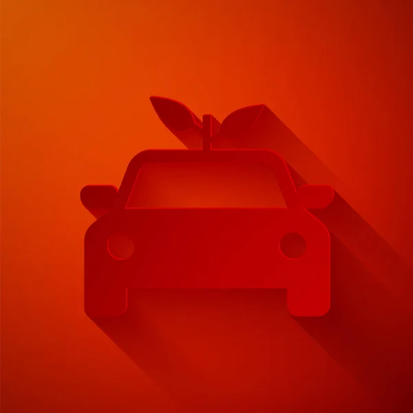 Papiergeschnittener Ökomobil-Konzeptantrieb mit Blattsymbol auf rotem Hintergrund. grüne Energie Auto-Symbol. Papierkunst. Vektorillustration — Stockvektor