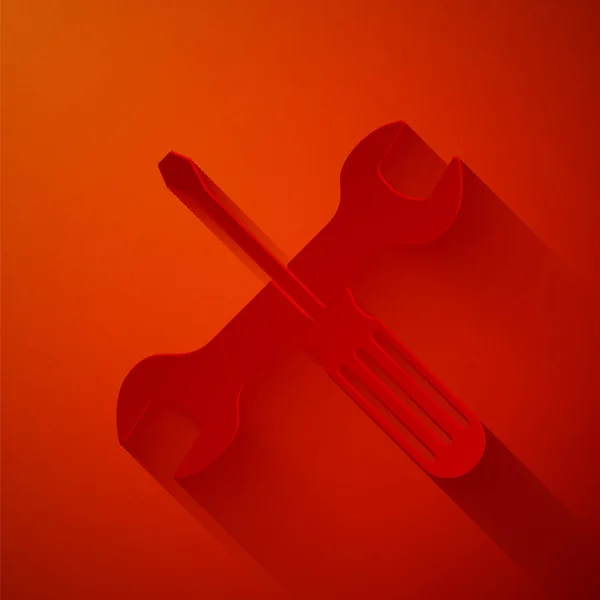 Corte de papel Chave de fenda cruzada e chave de ferramentas ícone isolado no fundo vermelho. Símbolo da ferramenta de serviço. Estilo de arte de papel. Ilustração vetorial —  Vetores de Stock