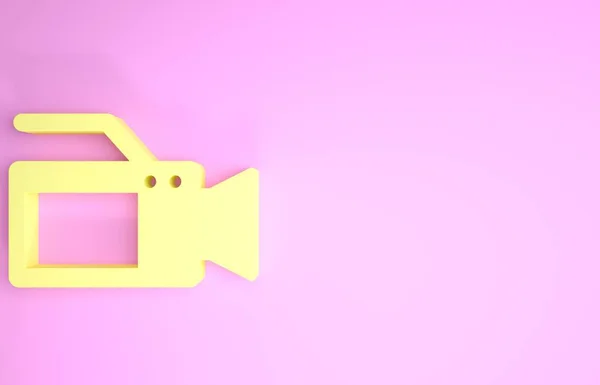 Icono de cámara de cine amarillo aislado sobre fondo rosa. Videocámara. Signo de película. Proyector de cine. Concepto minimalista. 3D ilustración 3D render — Foto de Stock