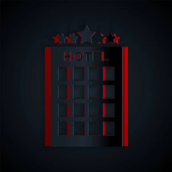 Řez papíru Hotel budova ikona izolované na černém pozadí. Papírový styl. Vektorová ilustrace — Stockový vektor
